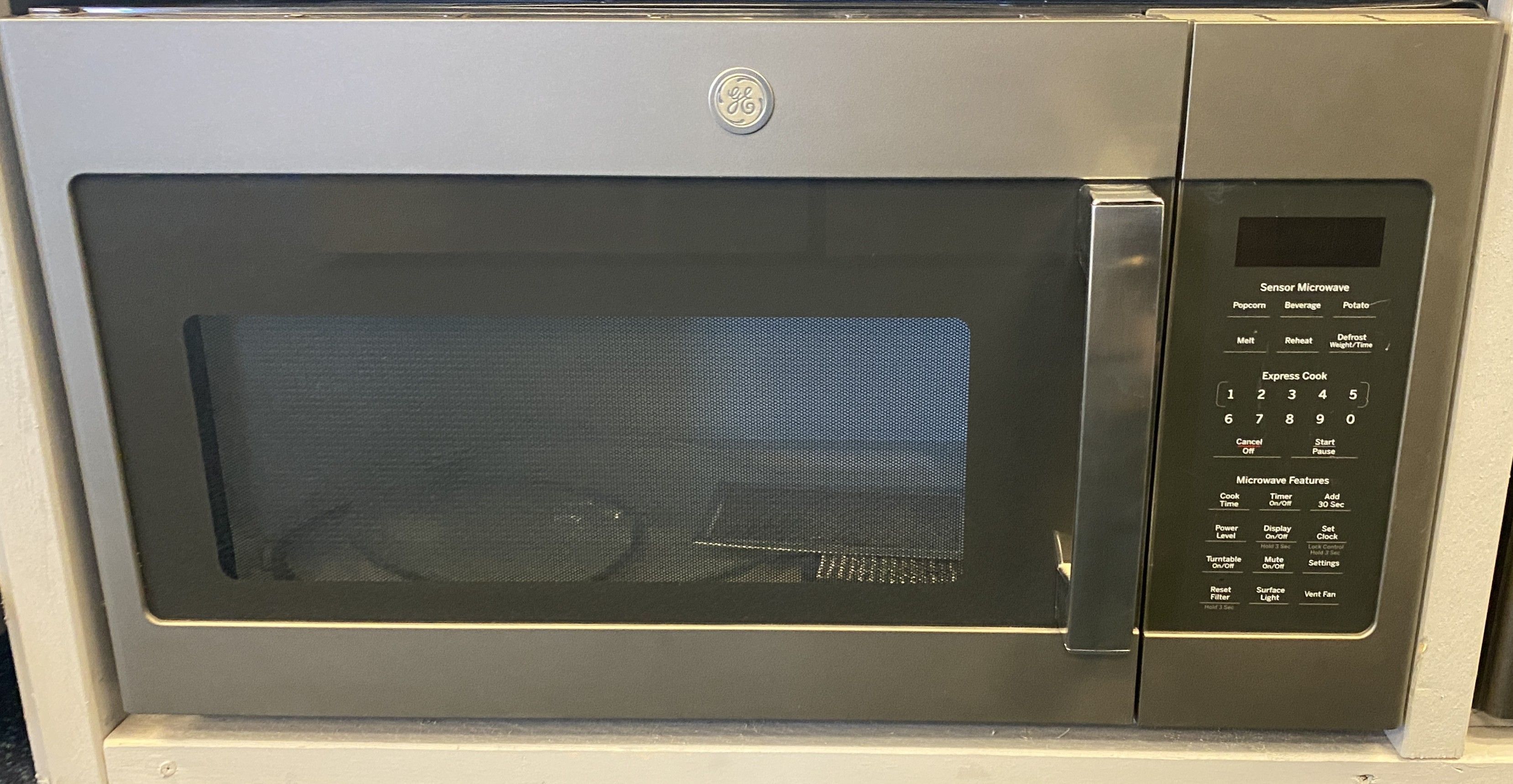 Black Stainless Steel GE Over The Range Microwave (8-0071)