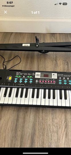 Adjustable Kids Piano Keyboard 61 Keys New W/charger 