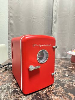 Red Frigidaire mini fridge