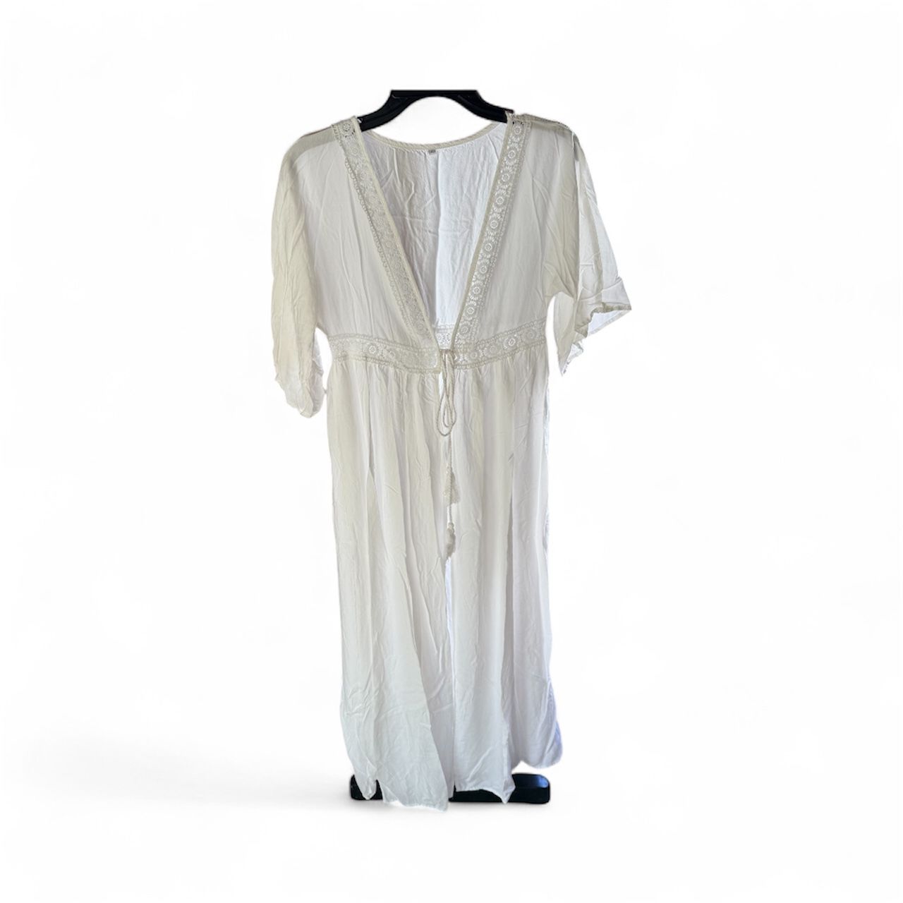 Sheer, white maxi-length beach cover-up with crochet trim and a tie front.