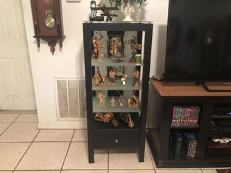Wood entertainment center with frosted shelves