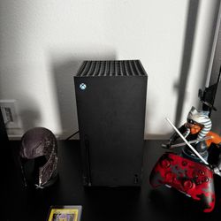 Xbox Series X with Controller and games