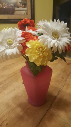 Decorative vase with artificial flowers