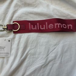 Lululemon Never Lost Red Keychain NWT