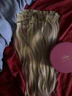 Blonde human hair extensions
