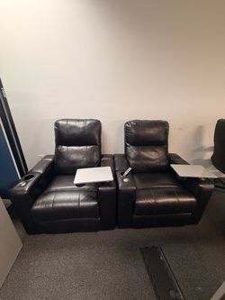 Two leather black Recliners