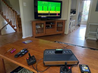 Vintage Atari 2600 console plus 25 games