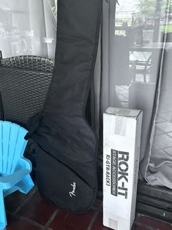 Guitar Carrying Bag And Guitar Rack