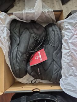 2 pairs wolverine steel toe boots.