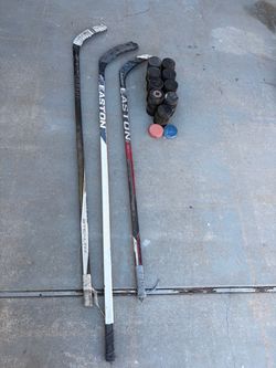 Hockey Pucks and Sticks