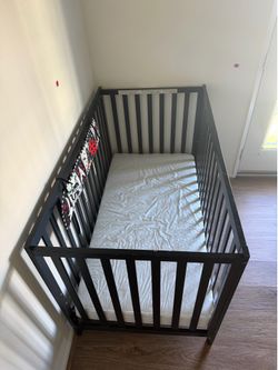 Baby crib with mattress