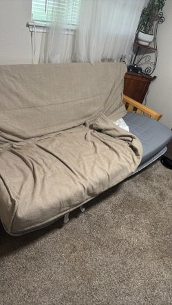 Futon with extra pad and protective cover