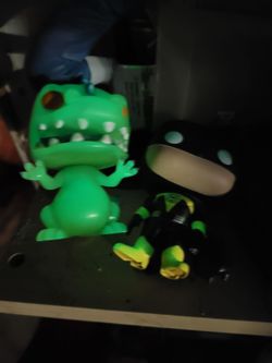 Glow in the dark funko pops. Reptar & Yellow Lantern Batman