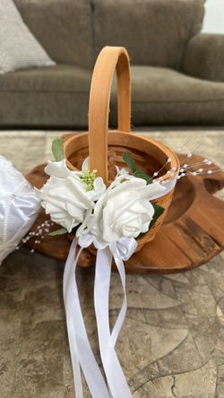 Flower girl basket and ring bearer pillow.