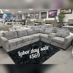 Gray corduroy sectional sofa with console