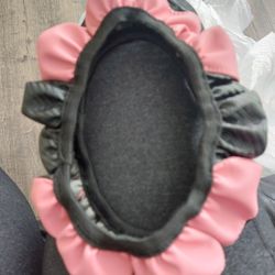 NEW PINK & BLACK STEERING WHEEL COVER.  SEE ALL PHOTO'S.  CASH/ PICKUP ONLY 