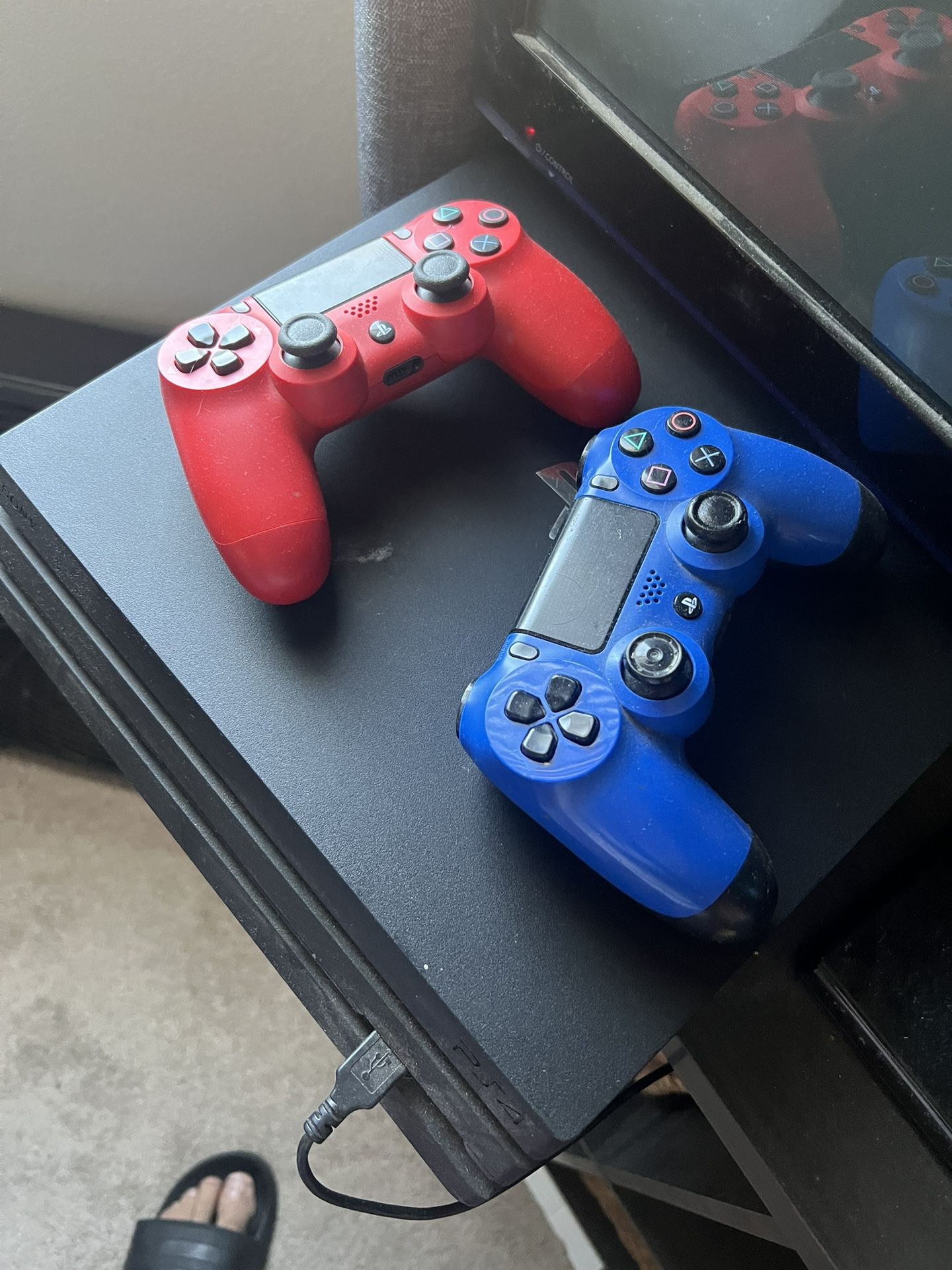 PS4 With Two Remotes And Games