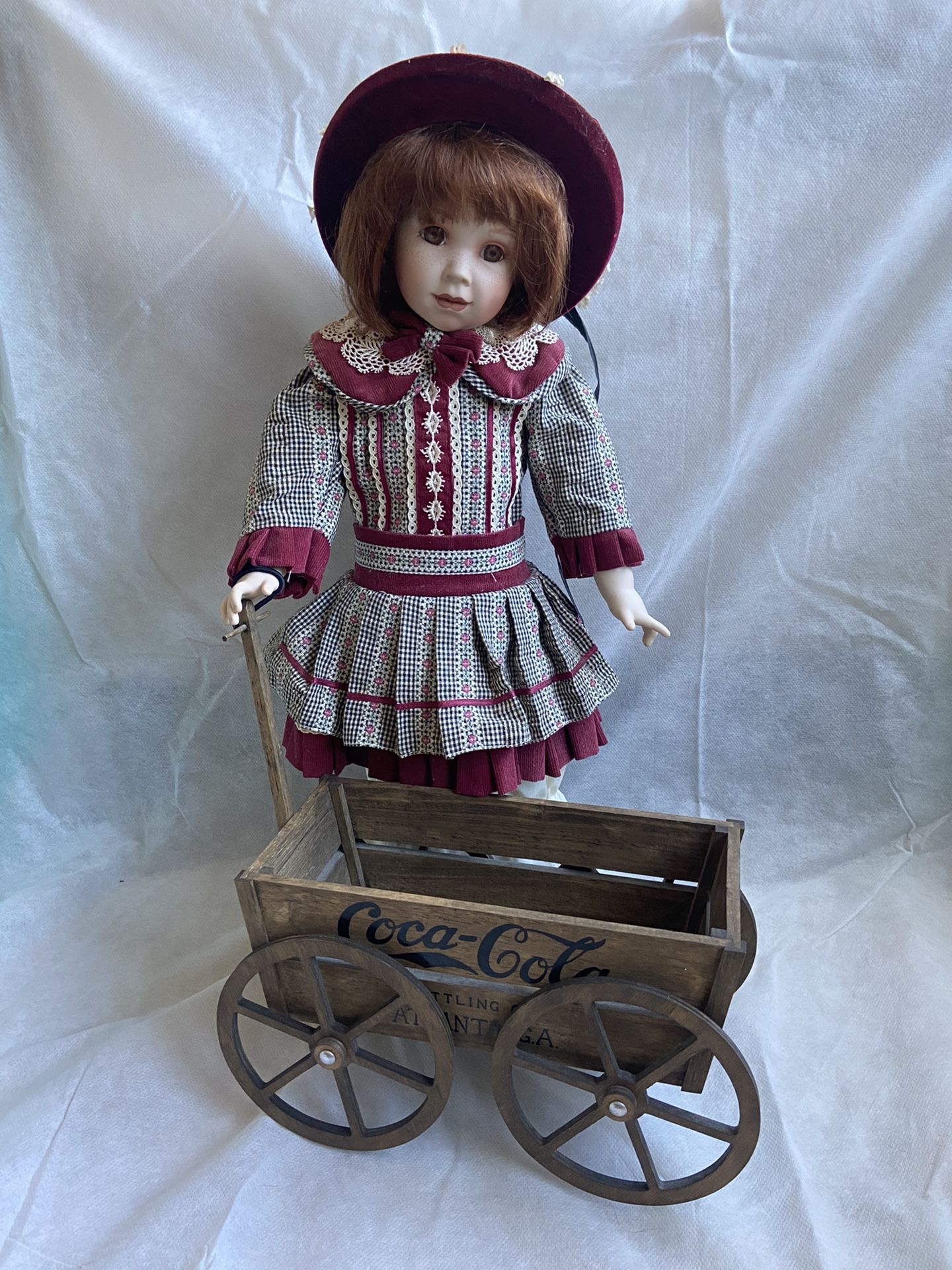 A LIMITED EDITION COCA-COLA HEIRLOOM COLLECTOR DOLL
