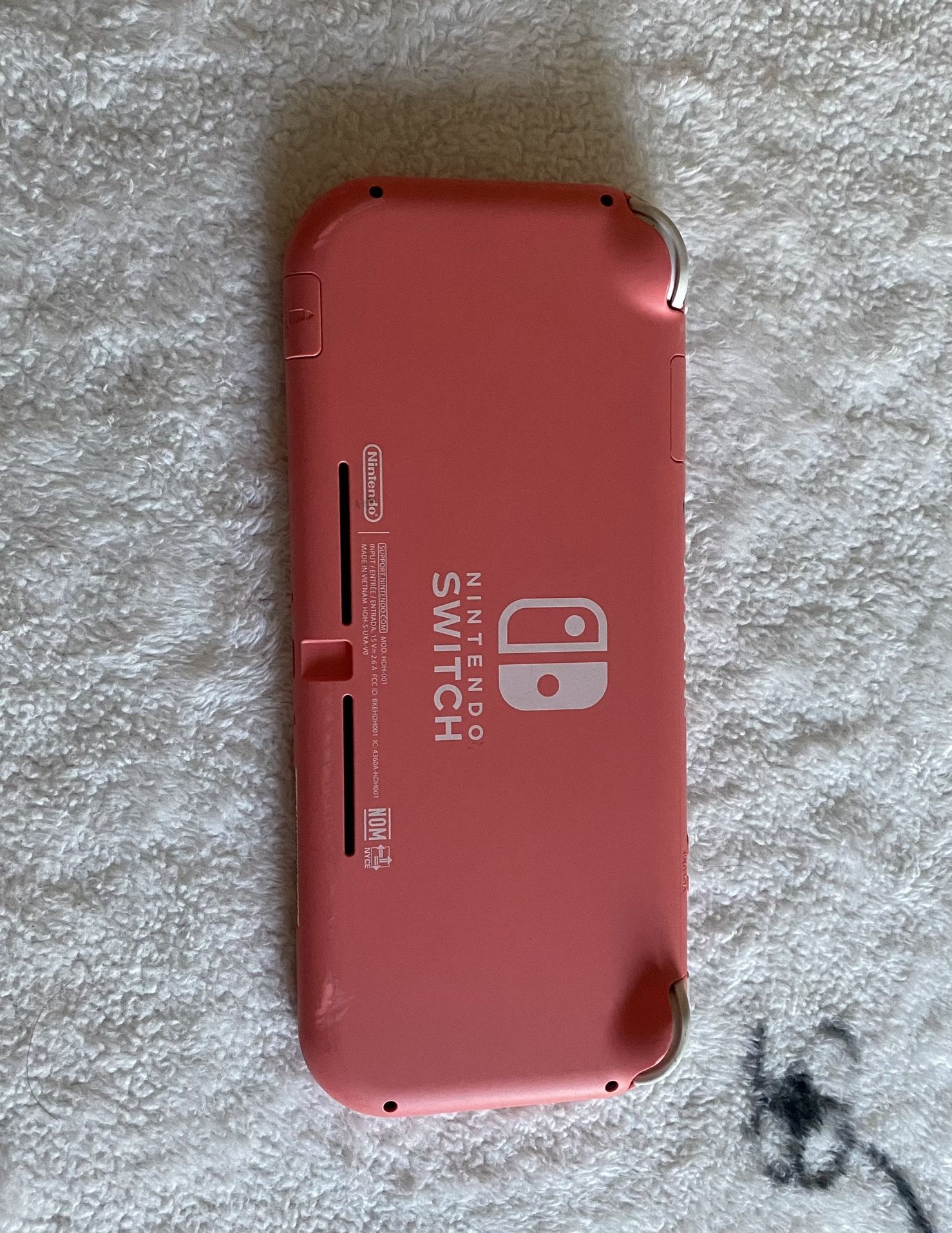 Nintendo Switch Lite. Pink & Blue