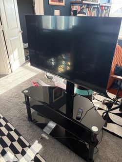 Hisense 42” TV and TV Stand