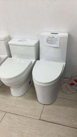 One Piece Toilet White Color New With Softclose Seat Fully Skirted With Dual Or Single Tornado Flush System Ready For Pick Up Today