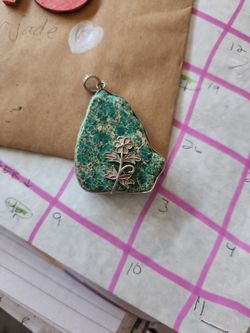 Nevada Turquoise With Sterling Silver Border And Flower Accent