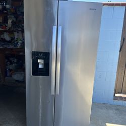 Refrigerator Whirlpool 25 CuFt .Stainless Steel Door Size :36” Wide By 70” High By .31” Depth .Water And Ice Dispenser .Works Perfectly .Glass Shelf .