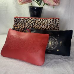 3 ASSORTED MAKE UP BAGS 