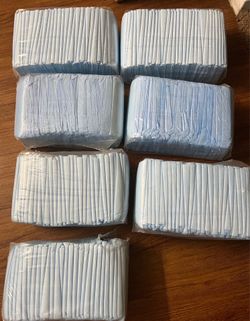 Disposable Bed Pads with Adhesive Strips 30 x 36 in Counts 28. Each Bag 5$