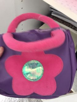 Stuffed animal carry purse