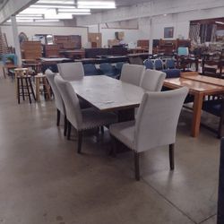 7 Foot Table W/ 6 Upholstered Chairs