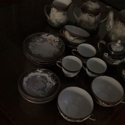 Porcelain Tea Set / cups/ saucers/ dragon design: $250.00 or best offer