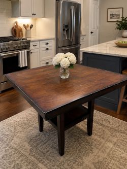 Sold wood square table (no chairs)