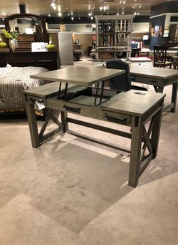 A desk with the lift up