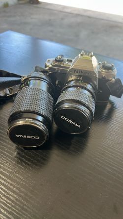 Nikon camera, 2 cosina lens and film
