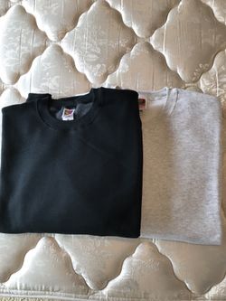 “Fruit Of The Loom” fleece sweaters. Colors only black and off white. Size’s XX and XXX only. Not hooded.