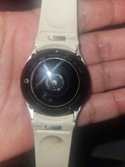 Samsung watch / purple earbuds