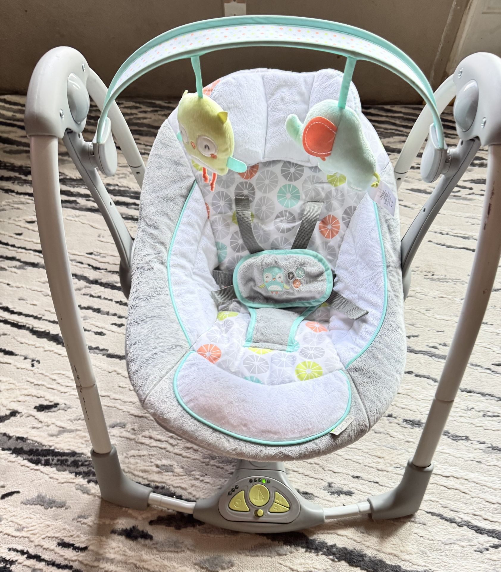 Ingenuity swing n go portable 5 speed swing with nature sound