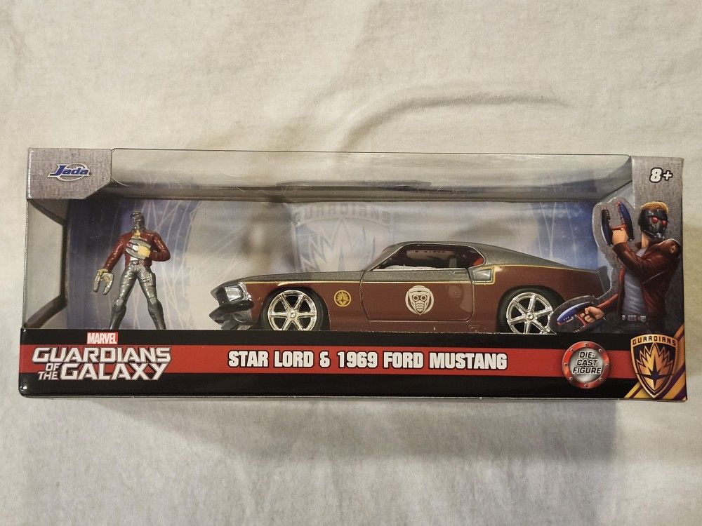 JADA METAL DIECAST CAR 1:32 SCALE. MARVEL GUARDIANS OF THE GALAXY. STAR LORD. 1969 FORD MUSTANG AND STAR LORD METAL DIECAST FIGURE.