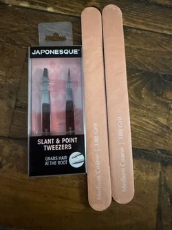 Slant & point tweezers , nail file