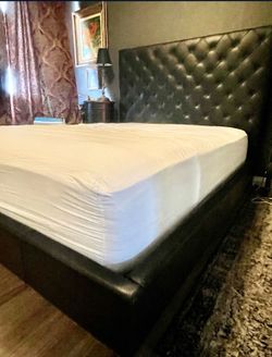 Black Queen size platform bed frame and slats .  Genuine Leather . designer Gus Modern for the W Hotels. Model Lyndon