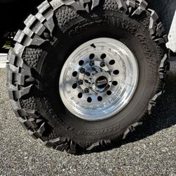8x170 American Racing Wheels In Mud Grapps 