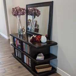 **Heavy Duty Dark Wood Bookshelf/ Tv Stand**
This can be used for a TV stand or a bookshelf
There are two removable panels in the back that magnetize 