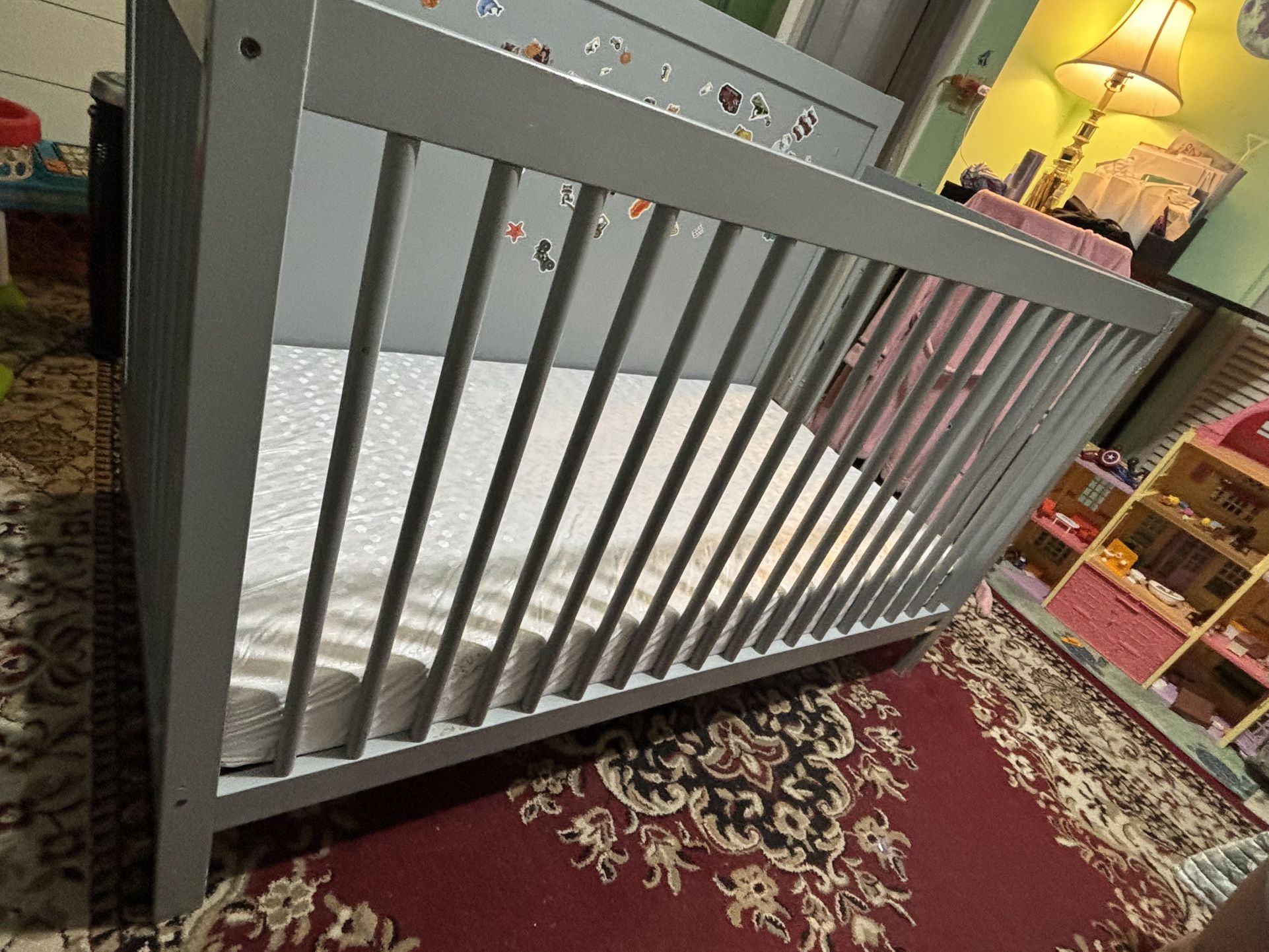 Crib, Mattress, Blanket, Fitted Sheets And Clothes