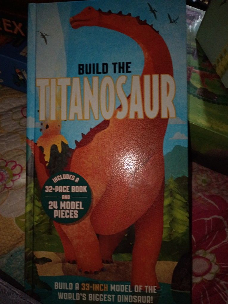 TITANASUAR BOOK AND 2FT MODEL BRAND NEW