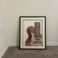 mixed-media collage style print of a guitar