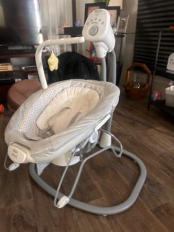 Graco Baby rocker and sit up chair