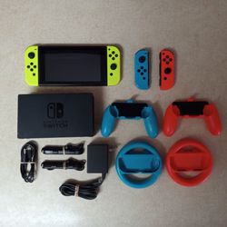 NINTENDO SWITCH V2 with Over 125 SWITCH GAMES MARIO KART,MARIO PARTY,POKEMON,ZELDA,MINECRAFT,and Many More