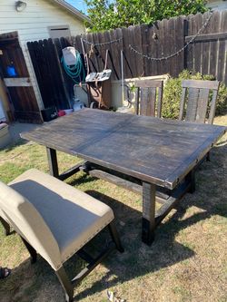 Black wood dining table with 2 chairs & bench
