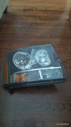 passenger side headlight 2014 Chevy Suburban, original